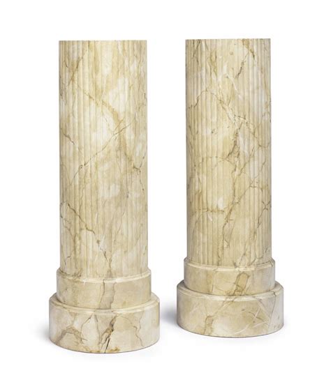 A Pair Of Faux Marble Decorated Fluted Circular Pedestals