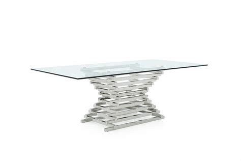 Pairing clear tempered glass and shiny steel, this versatile piece is an easy fit in any decor style. Modrest Crawford Modern Rectangular Glass Dining Table