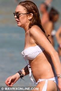Lindsay Lohan Continues Bikini Parade As She Hits The Beach In Greece Daily Mail Online