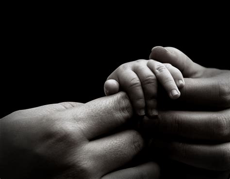 Baby Hand Holding Mothers Hand1 Jim Martin