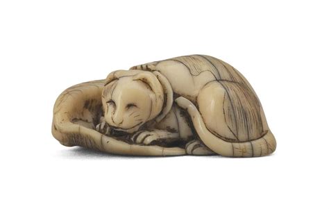 Great savings & free delivery / collection on many items. Lot - JAPANESE IVORY NETSUKE In the form of a cat lying on ...