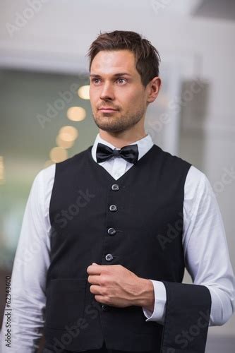 Handsome Waiter Looking Away Stock Photo And Royalty Free Images On