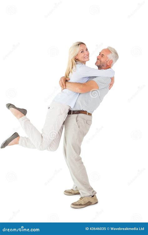 Man Picking Up His Partner While Hugging Here Stock Image Image Of People Relationship