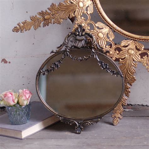There were a lot of i would however spend a bit more to get a larger mirror rather than having something too small it is decorative centerpiece mirrors, i am loving this style of mirror for wedding tables at the moment as. antique style small decorative mirror by made with love designs ltd | notonthehighstreet.com