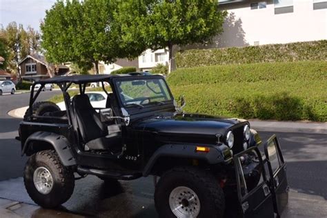 V8 Powered 1984 Jeep Cj7 With Genright Roll Cage And 4 Inch Rancho Lift