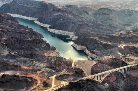 Aerial Photography Of White Suspension Bridge And Mountains Hoover Dam