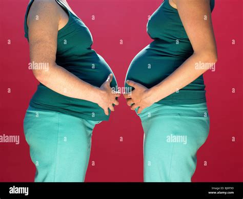 Pregnant Women Facing Each Other Stock Photo Alamy