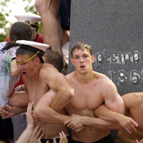 the ultimate collection of hot shirtless navy guys climbing a monument covered in lard 15 pics