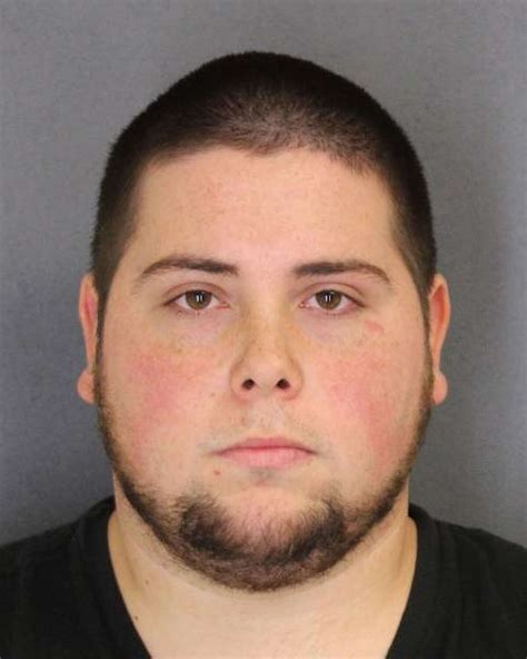 Albany cop accused of violating an order of protection