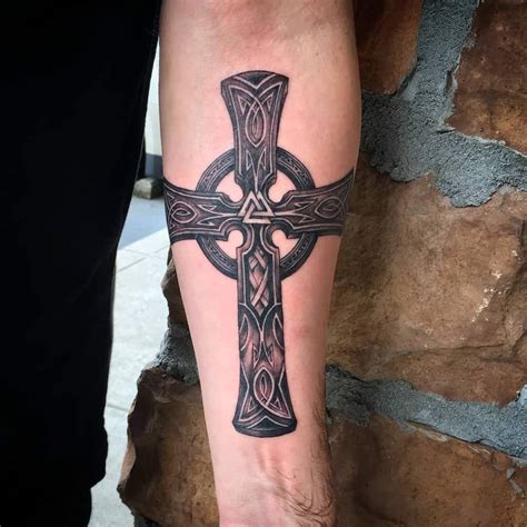 Forearm Tribal Cross Tattoos