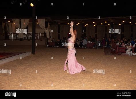 A Belly Dancer Performs During An Arabian Adventures Desert Safari In
