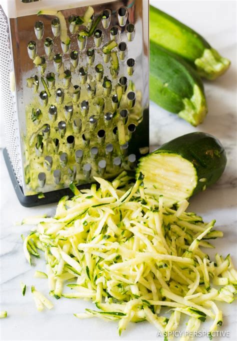 Add olive oil and toss to coat the zucchini slices thoroughly. Healthy Baked Zucchini Tots - A Spicy Perspective