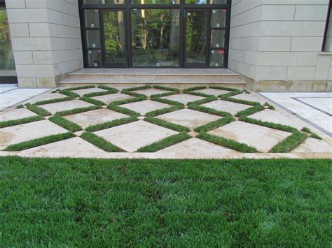 For driveways it is recommended that you wait at least 24 hours to drive on the driveway. Kinwood Landscape on Twitter: "Travertine pavers with grass joints give an elegant feel to this ...