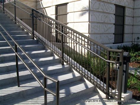 All different gates and doors can be installed on the entrance or exit of the stairs. Aluminum Stair Railing | Southeastern Ornamental Iron Works