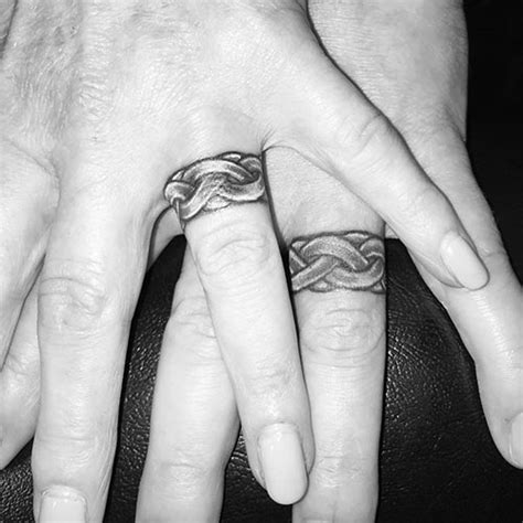 Not only can a wedding tattoo can help to remind you of your own roots, it is also appropriate because the knot work can represent a place of no beginning and no end—like love and the journey of your soul. Celtic Wedding Band Tattoo
