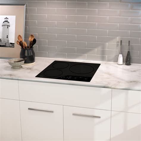 Combine style and function with a new kitchen sink. Wolf CI243CB 24 Inch Induction Cooktop with 3 Cooking ...