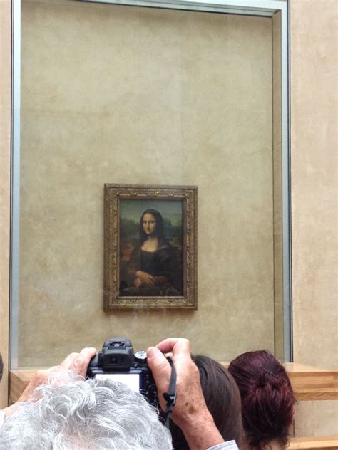 The Real Mona Lisa Painting In The Louvre Museum In Paris