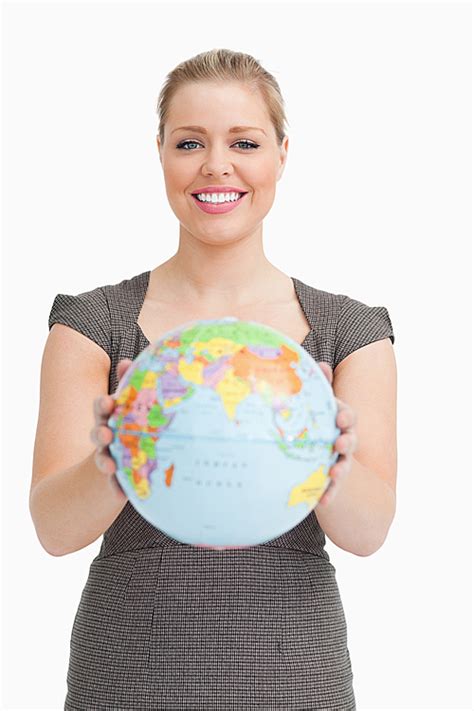 유토이미지 Woman showing a globe