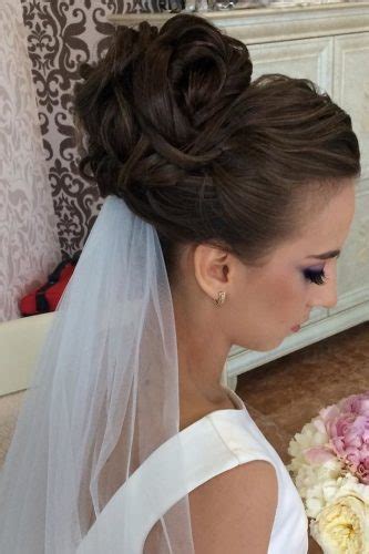 While subtle hair accessories beautify the hairstyle, the messy updo and minimal side swept bangs a timeless messy bun is one of the best hairstyles for a round face whether you're a bride, her girly be it for your engagement or cocktail or your wedding or reception, this hairstyle would literally go. 30 Wedding Bun Hairstyles | Page 4 of 11 | Wedding Forward