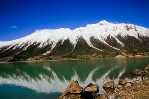 Embrace The Ranwu Lake And Snow Mountain China Tours