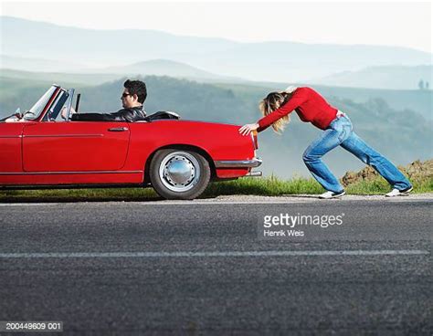 Young Woman Driving Red Convertible Car Side View Photos And Premium