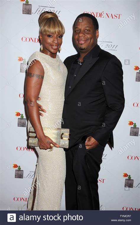 Mary J Blige In Gucci Dress And Husband Kendu Isaacs Arriving At The