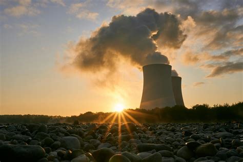 Low Angle Photo Of Nuclear Power Plant Buildings Emtting Smoke · Free
