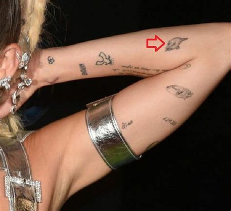 Miley Cyrus Tattoos Their Meanings Body Art Guru