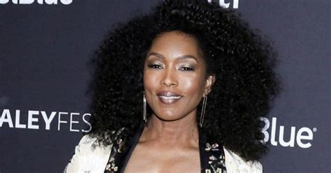 Angela Bassett 60 flaunts plunging cleavage in sheer lingerie exposé