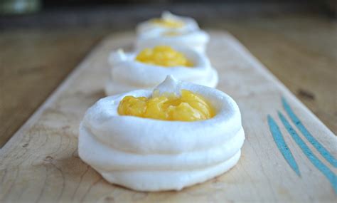 It is quite easy to make and takes less time and talent than even a fruit pie does. Meringue Bites with Lemon Curd and Berries - West of the Loop