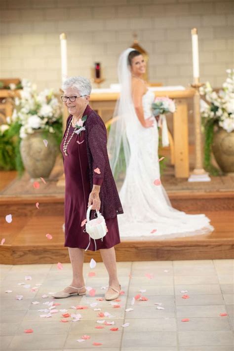 83 year old grandmother wins hearts as the flower girl at her granddaughter s wedding abc news