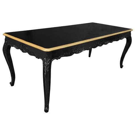 Choose the dining room table design that defines your family's style and character. Baroque dining table black lacquered wood and gold edge