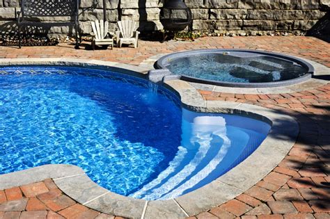 Inground Fiberglass Swimming Pool With Hot Tub Add On Fiberglass Pool Cost Pool Cost