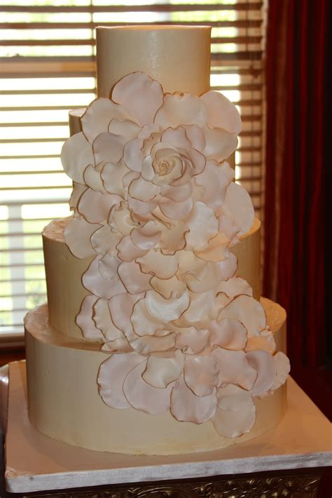 That's the petal cake and it takes major expertise to pull it. Rose Petal Wedding Cake