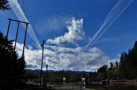 sky, clouds, contrails, and a dam | down out leaburg, oregon… | Flickr
