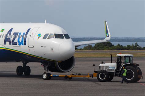 Pushback Service On A Azul Brazilian Airlines Aircraft Performed By A Dnata Tractor At Santarem