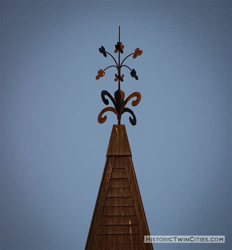 Weather Vane On Top Of The Clock Tower Of Old Main Hall At Hamline