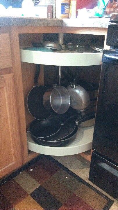 The lazy susan has a cover panel to conceal the side. Adjust your lazy susan for Pot rack in corner cabinet and ...