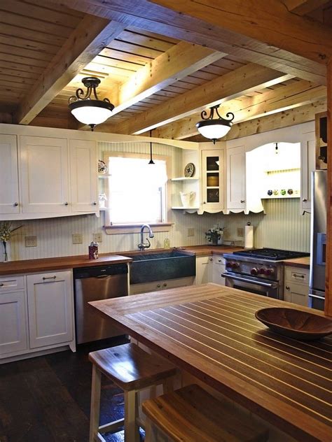 Color in the kitchen wasn't for cabinetry, it was for linens or serving ware or walls. Katahdin Cedar Log Homes: | Log home kitchens, Kitchen ...