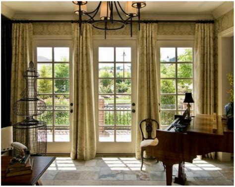 Applying window treatment basics and making accommodations for the door's functional purpose are keys to success. The window pane doors covering the entire length of the wall really open up the… | French door ...
