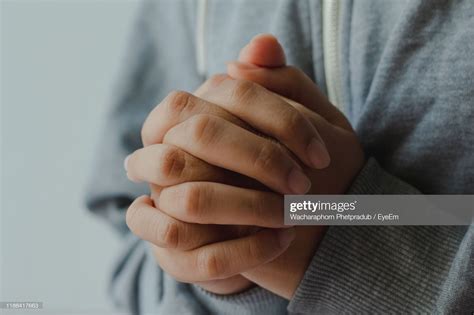 Stock Photo Close Up Of Person With Hands Clasped Hand Pose Hand