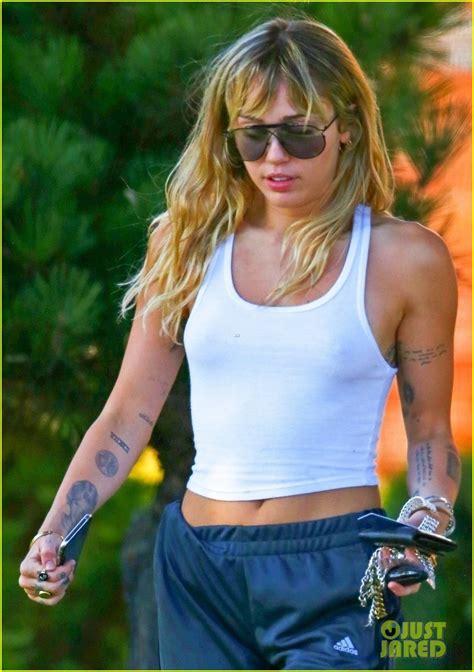 Miley Cyrus Shows Off Toned Torso In White Tank Top After Yoga Photo Miley Cyrus