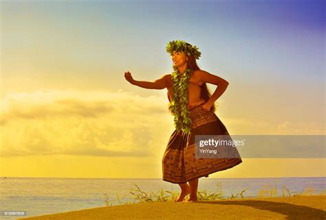 Portrait Of Hawaiian Hula Dancer On The Beach At Sunset High Res Stock