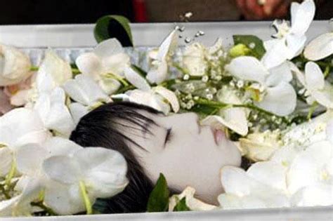 This video shows beautiful women in their funeral caskets! Error Page