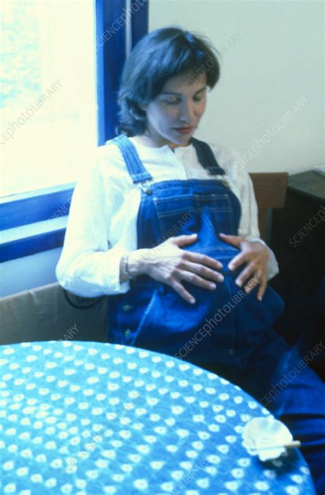 Pregnant Woman Smoking A Cigarette Indoors Stock Image M805 0489 Science Photo Library