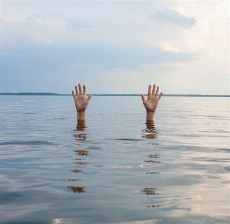Hands Sticking Out Of Water Stock Photo Image Of Failure Gesture