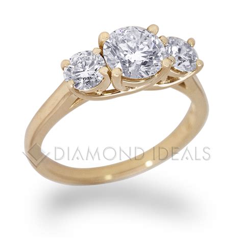 Our unique collection of diamond engagement rings has been finely crafted to ensure you find the perfect ring for your partner. DiamondIdeals.com | Three Stone Trellis Engagement Ring in Yellow Gold