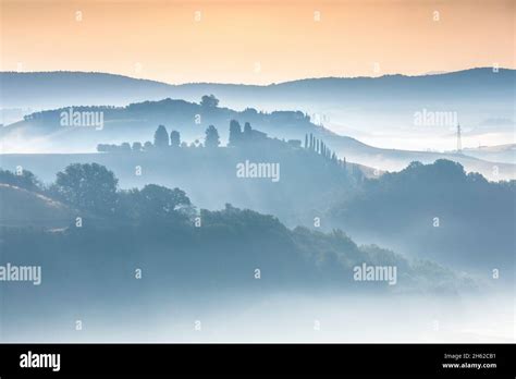 Tuscan Landscapemorning With Fog In The Valleys And Rolling Hills Of