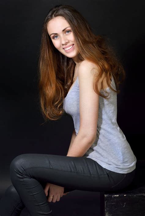 Beautiful Girl With Long Brown Hair In Casual Clothes Stock Image