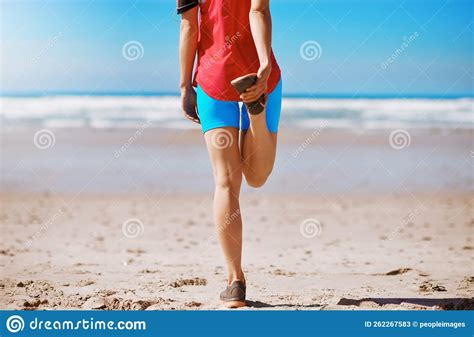 Woman Runner Stretching And Beach For Fitness Exercise Or Wellness